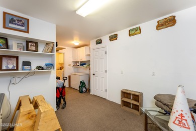 Welcome to this spacious 3-bedroom, 2-bathroom home with 1,826 on London Bridge Golf Course in Arizona - for sale on GolfHomes.com, golf home, golf lot