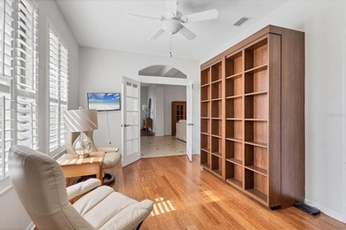 Situated on over a quarter acre of tranquil waterfront in the on Legacy Golf Club in Florida - for sale on GolfHomes.com, golf home, golf lot