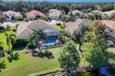 Situated on over a quarter acre of tranquil waterfront in the on Legacy Golf Club in Florida - for sale on GolfHomes.com, golf home, golf lot