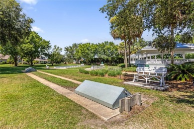 Welcome to your ideal home in The Villages, a vibrant 55+ on El Santiago Executive Golf Course in Florida - for sale on GolfHomes.com, golf home, golf lot