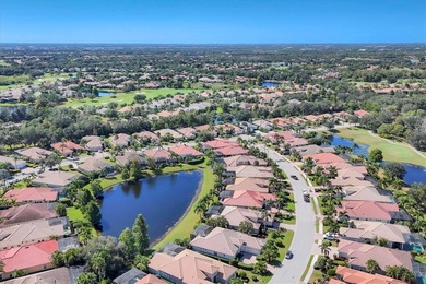 Situated on over a quarter acre of tranquil waterfront in the on Legacy Golf Club in Florida - for sale on GolfHomes.com, golf home, golf lot