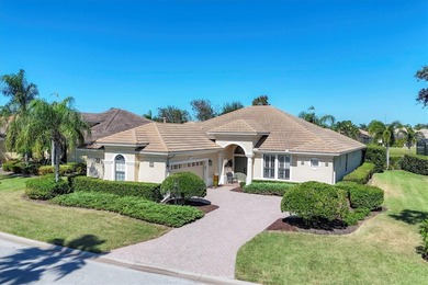 Situated on over a quarter acre of tranquil waterfront in the on Legacy Golf Club in Florida - for sale on GolfHomes.com, golf home, golf lot