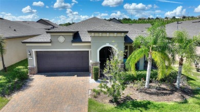 Fall in Love with this custom POOL home in the highly desirable on Ridgewood Lakes Golf and Country Club in Florida - for sale on GolfHomes.com, golf home, golf lot