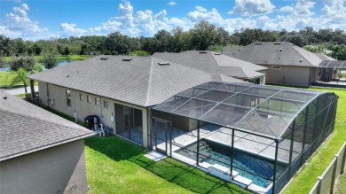 Fall in Love with this custom POOL home in the highly desirable on Ridgewood Lakes Golf and Country Club in Florida - for sale on GolfHomes.com, golf home, golf lot