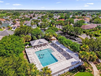 Welcome to your ideal home in The Villages, a vibrant 55+ on El Santiago Executive Golf Course in Florida - for sale on GolfHomes.com, golf home, golf lot