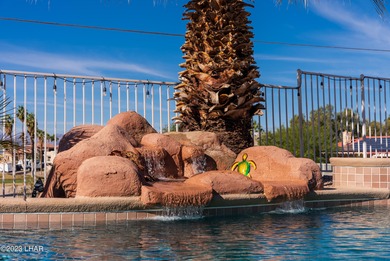 Welcome to this spacious 3-bedroom, 2-bathroom home with 1,826 on London Bridge Golf Course in Arizona - for sale on GolfHomes.com, golf home, golf lot