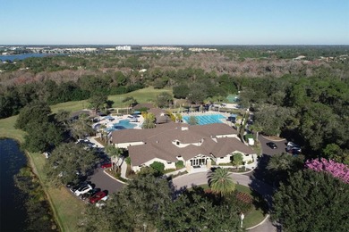 Situated on over a quarter acre of tranquil waterfront in the on Legacy Golf Club in Florida - for sale on GolfHomes.com, golf home, golf lot