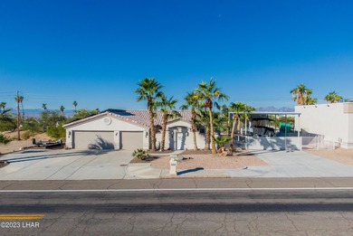 Welcome to this spacious 3-bedroom, 2-bathroom home with 1,826 on London Bridge Golf Course in Arizona - for sale on GolfHomes.com, golf home, golf lot