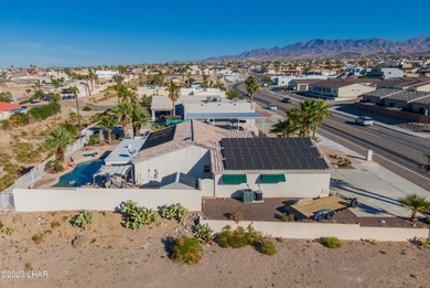 Welcome to this spacious 3-bedroom, 2-bathroom home with 1,826 on London Bridge Golf Course in Arizona - for sale on GolfHomes.com, golf home, golf lot