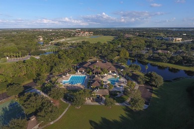 Situated on over a quarter acre of tranquil waterfront in the on Legacy Golf Club in Florida - for sale on GolfHomes.com, golf home, golf lot