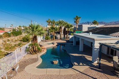 Welcome to this spacious 3-bedroom, 2-bathroom home with 1,826 on London Bridge Golf Course in Arizona - for sale on GolfHomes.com, golf home, golf lot