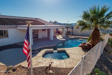 Welcome to this spacious 3-bedroom, 2-bathroom home with 1,826 on London Bridge Golf Course in Arizona - for sale on GolfHomes.com, golf home, golf lot