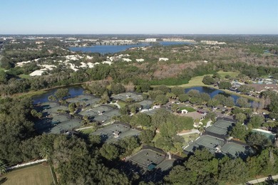 Situated on over a quarter acre of tranquil waterfront in the on Legacy Golf Club in Florida - for sale on GolfHomes.com, golf home, golf lot