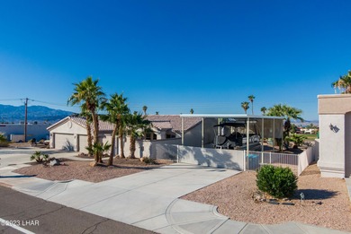 Welcome to this spacious 3-bedroom, 2-bathroom home with 1,826 on London Bridge Golf Course in Arizona - for sale on GolfHomes.com, golf home, golf lot