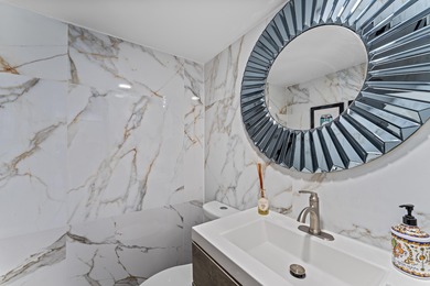 Step into elegance in this fully remodeled, turnkey residence on Turnberry Isle Resort and Club in Florida - for sale on GolfHomes.com, golf home, golf lot