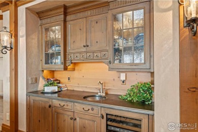 Set on arguably the best lot in all of Harmony Club, this custom on Harmony Golf Club in Colorado - for sale on GolfHomes.com, golf home, golf lot