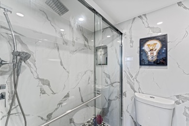 Step into elegance in this fully remodeled, turnkey residence on Turnberry Isle Resort and Club in Florida - for sale on GolfHomes.com, golf home, golf lot