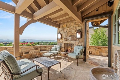 Set on arguably the best lot in all of Harmony Club, this custom on Harmony Golf Club in Colorado - for sale on GolfHomes.com, golf home, golf lot