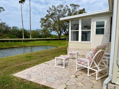 Charming Waterfront Retreat - 8711 26th Ave. E, Sun Key Village on River Run Golf Links in Florida - for sale on GolfHomes.com, golf home, golf lot