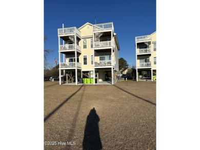 STUNNING LOCATION! Beautiful townhouse overlooking the Northwest on Harbour Point Golf Club in North Carolina - for sale on GolfHomes.com, golf home, golf lot