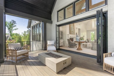 Indulge in luxury lake life in this 6-bedroom, 6.5- bath lake on Reynolds Lake Oconee - The Oconee in Georgia - for sale on GolfHomes.com, golf home, golf lot