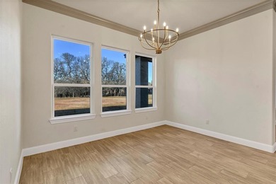 Located inside the guard-gated community of Pecan Plantation on Pecan Plantation Country Club in Texas - for sale on GolfHomes.com, golf home, golf lot