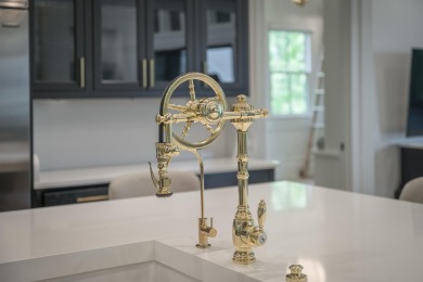 Indulge in luxury lake life in this 6-bedroom, 6.5- bath lake on Reynolds Lake Oconee - The Oconee in Georgia - for sale on GolfHomes.com, golf home, golf lot