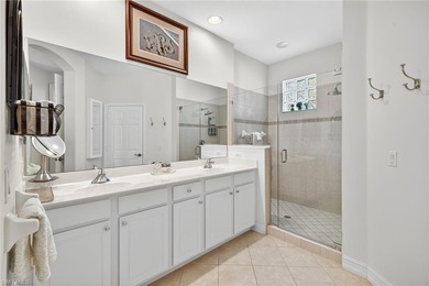 Bright & Spacious Lakeview Home with Desirable Open Floor Plan! on Pelican Sound Golf and River Club in Florida - for sale on GolfHomes.com, golf home, golf lot