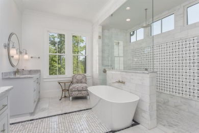 Indulge in luxury lake life in this 6-bedroom, 6.5- bath lake on Reynolds Lake Oconee - The Oconee in Georgia - for sale on GolfHomes.com, golf home, golf lot