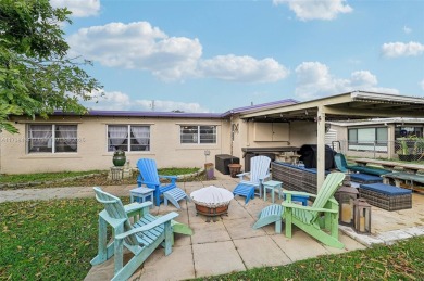 Charming 2-bedroom, 2-bathroom home located in desirable Sunrise on Sunrise Lakes Phase III in Florida - for sale on GolfHomes.com, golf home, golf lot