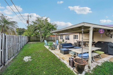 Charming 2-bedroom, 2-bathroom home located in desirable Sunrise on Sunrise Lakes Phase III in Florida - for sale on GolfHomes.com, golf home, golf lot