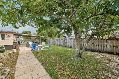 Charming 2-bedroom, 2-bathroom home located in desirable Sunrise on Sunrise Lakes Phase III in Florida - for sale on GolfHomes.com, golf home, golf lot