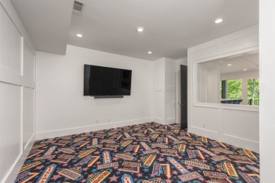 Indulge in luxury lake life in this 6-bedroom, 6.5- bath lake on Reynolds Lake Oconee - The Oconee in Georgia - for sale on GolfHomes.com, golf home, golf lot