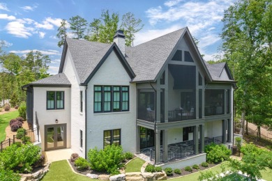 Indulge in luxury lake life in this 6-bedroom, 6.5- bath lake on Reynolds Lake Oconee - The Oconee in Georgia - for sale on GolfHomes.com, golf home, golf lot