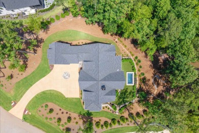 Indulge in luxury lake life in this 6-bedroom, 6.5- bath lake on Reynolds Lake Oconee - The Oconee in Georgia - for sale on GolfHomes.com, golf home, golf lot