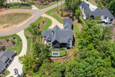 Indulge in luxury lake life in this 6-bedroom, 6.5- bath lake on Reynolds Lake Oconee - The Oconee in Georgia - for sale on GolfHomes.com, golf home, golf lot