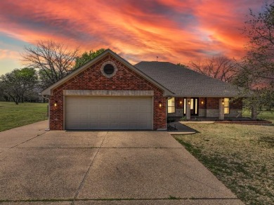 Welcome to a stunning home located in the gated community of on White Bluff Resort - New Course in Texas - for sale on GolfHomes.com, golf home, golf lot