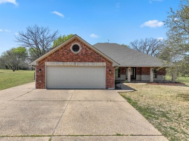 Welcome to a stunning home located in the gated community of on White Bluff Resort - New Course in Texas - for sale on GolfHomes.com, golf home, golf lot