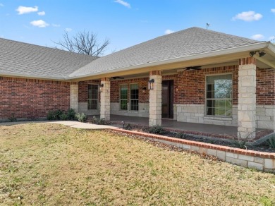 Welcome to a stunning home located in the gated community of on White Bluff Resort - New Course in Texas - for sale on GolfHomes.com, golf home, golf lot