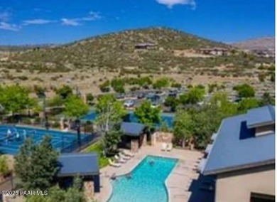 STUNNING MOUNTAIN VIEWS! This luxury soundproof townhome is a on StoneRidge Golf Course in Arizona - for sale on GolfHomes.com, golf home, golf lot