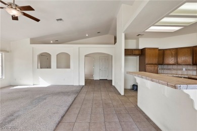 A Retreat on the Fairway. This 3-bedroom, 2-bath home on Mojave Resort Golf Club in Nevada - for sale on GolfHomes.com, golf home, golf lot