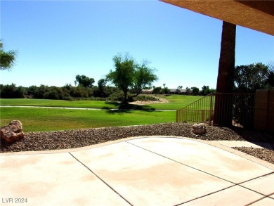 A Retreat on the Fairway. This 3-bedroom, 2-bath home on Mojave Resort Golf Club in Nevada - for sale on GolfHomes.com, golf home, golf lot