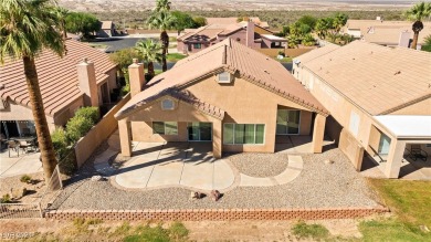 A Retreat on the Fairway. This 3-bedroom, 2-bath home on Mojave Resort Golf Club in Nevada - for sale on GolfHomes.com, golf home, golf lot