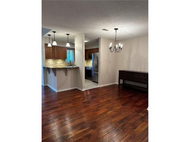 Beautifully Updated Mission Lake Townhome Backing to Scenic on Minor Park Golf Course in Missouri - for sale on GolfHomes.com, golf home, golf lot