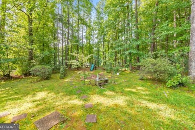 Welcome to this stunning 5 bedroom, 2.5 bathroom home nestled in on Brookstone Golf and Country Club in Georgia - for sale on GolfHomes.com, golf home, golf lot