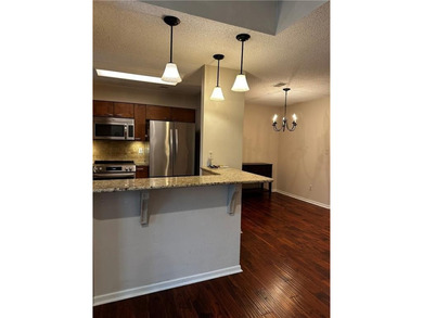 Beautifully Updated Mission Lake Townhome Backing to Scenic on Minor Park Golf Course in Missouri - for sale on GolfHomes.com, golf home, golf lot