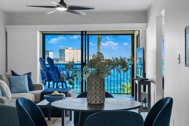 Premium WATERFRONT CORNER CONDO WITH PANORAMIC WATER VIEWS ON on Isla Del Sol Yacht and Country Club in Florida - for sale on GolfHomes.com, golf home, golf lot