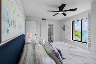 Premium WATERFRONT CORNER CONDO WITH PANORAMIC WATER VIEWS ON on Isla Del Sol Yacht and Country Club in Florida - for sale on GolfHomes.com, golf home, golf lot