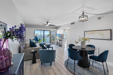 Premium WATERFRONT CORNER CONDO WITH PANORAMIC WATER VIEWS ON on Isla Del Sol Yacht and Country Club in Florida - for sale on GolfHomes.com, golf home, golf lot