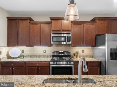 Welcome to this beautifully maintained two-story townhouse in on Plantation Lakes Golf and Country Club in Delaware - for sale on GolfHomes.com, golf home, golf lot